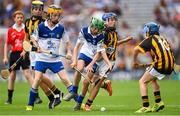 9 August 2015; Brody Murphy, Ballymurn NS, Enniscorthy, Wexford, representing Waterford,  in action against Seán Magill, Scoil Mhuire na nGael, Dundalk, Louth, representing Kilkenny, during the Cumann na mBunscol INTO Respect Exhibition Go Games 2015 at Kilkenny v Waterford - GAA Hurling All-Ireland Senior Championship Semi-Final. Croke Park, Dublin. Picture credit: Stephen McCarthy / SPORTSFILE
