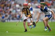 9 August 2015; Eva Collins, St Canices Ed, representing Kilkenny, in action against Emer O’Donnell, St Patrick’s Girls, Carndonagh, Donegal, representing Waterford, during the Cumann na mBunscol INTO Respect Exhibition Go Games 2015 at Kilkenny v Waterford - GAA Hurling All-Ireland Senior Championship Semi-Final. Croke Park, Dublin. Picture credit: Ray McManus / SPORTSFILE
