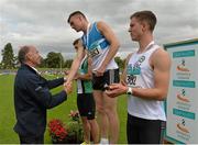 9 August 2015; Jim Dowdall, CEO of GloHealth, presents Marcus Lawler, St Laurence O'Toole A.C, with his gold medal after winning the men's 100m. GloHealth Senior Track and Field Championships. Morton Stadium, Santry, Co. Dublin. Picture credit: Matt Browne / SPORTSFILE