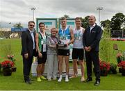 9 August 2015; Kathleen Larkin makes a presentation to Marcus Lawler, St Laurence O'Toole A.C, also pictured are, from left, Ciarán Ó Catháin, President of Athletics Ireland, second place Jonathan Browning, Ballymena & Antrim A.C, third place Zak Irwin, Sligo A.C. and Jim Dowdall, CEO of GloHealth, after the men's 100m. GloHealth Senior Track and Field Championships. Morton Stadium, Santry, Co. Dublin. Picture credit: Matt Browne / SPORTSFILE