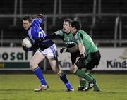3 January 2009; David Givney, Cavan, in action against Niall McGovern and Ryan Dillon, Queen's University. Gaelic Life Dr. McKenna Cup, Section C, Round 1, Cavan v Queen's University, Breffni Park, Cavan. Picture credit: Oliver McVeigh / SPORTSFILE