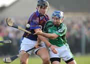 4 January 2009; Deamien Reele, Limerick, in action against John Greene, University Limerick. Waterford Crystal Cup, Limerick v University Limerick, Claughaun GAA Club, Claughaun, Limerick. Picture credit: Pat Murphy / SPORTSFILE