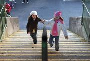 4 January 2009; Seven year old Tara Mullen, left, and her sister Roisin, aged 6, from Slane, Co. Meath, arrive before the start of the game. O'Byrne Cup, First Round, Meath v Westmeath, Pairc Tailteann, Navan, Co. Meath. Photo by Sportsfile
