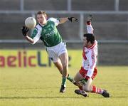 4 January 2009; James Sherry, Fermanagh, in action against Niall Bradley, Derry. Gaelic Life Dr. McKenna Cup, Section A, Round 1, Fermanagh v Derry, Brewster Park, Enniskillen, Fermanagh. Picture credit: Oliver McVeigh / SPORTSFILE