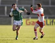 4 January 2009; James Sherry, Fermanagh, in action against Aidan McAlynn, Derry. Gaelic Life Dr. McKenna Cup, Section A, Round 1, Fermanagh v Derry, Brewster Park, Enniskillen, Fermanagh. Picture credit: Oliver McVeigh / SPORTSFILE