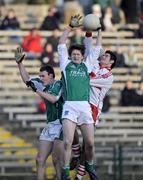 4 January 2009; James Sherry and Shane O'Brien, Fermanagh, in action against Chris McKaigue, Derry. Gaelic Life Dr. McKenna Cup, Section A, Round 1, Fermanagh v Derry, Brewster Park, Enniskillen, Fermanagh. Picture credit: Oliver McVeigh / SPORTSFILE