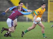 4 January 2009; Emlyn Mulligan, Leitrim, in action against Paul McGimley and Colin Canney, GMIT. FBD Connacht League, Section 2, GMIT v Leitrim, Tuam Stadium, Tuam, Co. Galway. Picture credit: Ray Ryan / SPORTSFILE
