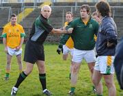 4 January 2009; Referee Gearoid O'Connamh displays the new rules on Leitrim players before the match. FBD Connacht League, Section 2, GMIT v Leitrim, Tuam Stadium, Tuam, Co. Galway. Picture credit: Ray Ryan / SPORTSFILE