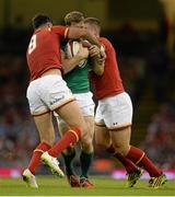 8 August 2015; Andrew Trimble, Ireland, is tackled by Dan Baker, left, and Scott Williams, Wales. Rugby World Cup Warm-Up Match, Wales v Ireland, Millennium Stadium, Cardiff, Wales. Picture credit: Brendan Moran / SPORTSFILE
