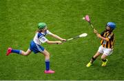 9 August 2015; Lucy O’Kane, St. John’s PS, Coleraine, Derry, representing Waterford, in action against Amber House, Rathcoyle NS, Kiltegan, Wicklow, representing Kilkenny, during the Cumann na mBunscol INTO Respect Exhibition Go Games 2015 at Kilkenny v Waterford - GAA Hurling All-Ireland Senior Championship Semi-Final. Croke Park, Dublin. Picture credit: Dáire Brennan / SPORTSFILE