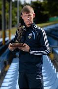 11 August 2015; Ryan Swan, UCD, with his SSE Airtricity player of the month award for July 2015. Belfield Bowl, Belfield, UCD, Dublin. Picture credit: Seb Daly / SPORTSFILE