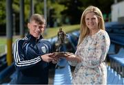 11 August 2015; UCD's Ryan Swan is presented with his SSE Airtricity player of the month award for July 2015 by Leanne Sheill, from Airtricity. Belfield Bowl, Belfield, UCD, Dublin. Picture credit: Seb Daly / SPORTSFILE