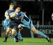 10 January 2009; Isa Nacewa, Leinster, is tackled by Jason Yapp, right, and Andy Powell, Cardiff Blues. Magners League, Leinster v Cardiff Blues, RDS, Dublin. Picture credit: Stephen McCarthy / SPORTSFILE