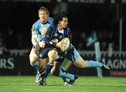 10 January 2009; Isa Nacewa, Leinster, is tackled by Jason Yapp, and Andy Powell, left, Cardiff Blues. Magners League, Leinster v Cardiff Blues, RDS, Dublin. Picture credit: Stephen McCarthy / SPORTSFILE