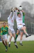 11 January 2009; Kildare's Robert Kelly and Ronan Sweeney, left, win possession against Mark Ward, Meath. O'Byrne Cup Quarter-Final, Kildare v Meath, St Conleth's Park, Newbridge, Co. Kildare. Picture credit: Pat Murphy / SPORTSFILE