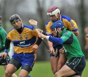 11 January 2009; James McInerney, Limerick IT, in action against Tony Carmody, left, and Conor Hassett, Clare. Waterford Crystal Cup Quarter-Final, Clare v Limerick IT, Meelick, Clare. Picture credit: Brian Lawless / SPORTSFILE