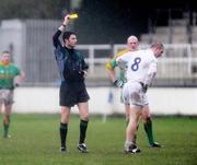 11 January 2009; Referee Gary McCormack shows a yellow card to Kildare's Daryl Flynn. O'Byrne Cup Quarter-Final, Kildare v Meath, St Conleth's Park, Newbridge, Co. Kildare. Picture credit: Pat Murphy / SPORTSFILE