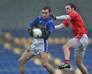11 January 2009; Kevin Smith, Longford, in action against Derek Crilly, Louth. O'Byrne Cup Quarter-Final, Longford v Louth, Pearse Park, Longford. Picture credit: David Maher / SPORTSFILE