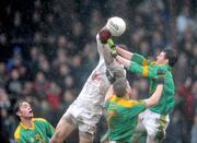 11 January 2009; Willie Heffernan, Kildare, in action against Meath's, from left, Brian Meade, Terry Skelly and Andrew Collins. O'Byrne Cup Quarter-Final, Kildare v Meath, St Conleth's Park, Newbridge, Co. Kildare. Picture credit: Pat Murphy / SPORTSFILE