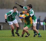 11 January 2009; Conal Dunne, Donegal, in action against Ciaran McElroy, Fermanagh. Gaelic Life Dr. McKenna Cup, Section A, Round 2, Donegal v Fermanagh, Ballyshannon, Co. Donegal. Picture credit: Oliver McVeigh / SPORTSFILE