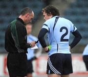 11 January 2009; Dublin corner-back Colin Moore has his name taken before being issued with a 'black card' by referee Cormac Reilly. O'Byrne Cup Quarter-Final, Dublin v Wicklow, Parnell Park, Dublin. Picture credit: Ray McManus / SPORTSFILE