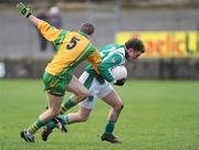 11 January 2009; Eamon Maguire, Fermanagh, in action against Chris Byrne, Donegal. Gaelic Life Dr. McKenna Cup, Section A, Round 2, Donegal v Fermanagh, Ballyshannon, Co. Donegal. Picture credit: Oliver McVeigh / SPORTSFILE