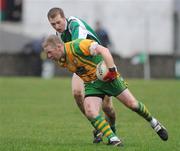 11 January 2009; Brian Roper, Donegal, in action against Tommy McElroy, Fermanagh. Gaelic Life Dr. McKenna Cup, Section A, Round 2, Donegal v Fermanagh, Ballyshannon, Co. Donegal. Picture credit: Oliver McVeigh / SPORTSFILE