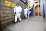 11 January 2009; Umpires walk around a flooded area during half-time. O'Byrne Cup Quarter-Final, Longford v Louth, Pearse Park, Longford. Picture credit: David Maher / SPORTSFILE