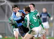 14 January 2009; Conor Murray, UUJ, in action against Martin McGrath and Shane McDermott, Fermanagh. Gaelic Life Dr. McKenna Cup, Section A, Round 3, Fermanagh v UUJ, Brewster Park, Enniskillen, Co. Fermanagh. Picture credit: Oliver McVeigh / SPORTSFILE