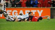 16 January 2009; David Wallace, Munster, goes over for his try against Sale Sharks despite the tackle of Charlie Hodgson, 10,  and Richard Wigglesworth. Heineken Cup, Pool 1, Round 5, Munster v Sale Sharks, Thomond Park, Limerick. Picture credit: Matt Browne / SPORTSFILE
