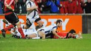 16 January 2009; David Wallace, Munster, goes over for his try against Sale Sharks despite the tackle of Charlie Hodgson, 10,  and Richard Wigglesworth. Heineken Cup, Pool 1, Round 5, Munster v Sale Sharks, Thomond Park, Limerick. Picture credit: Matt Browne / SPORTSFILE
