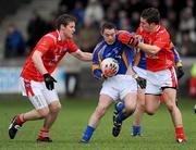 18 January 2009; John McGrath, Wicklow, in action against Ronan Carroll, left and Padraig Rath, Louth. O'Byrne Cup Semi-Final, Louth v Wicklow, Drogheda, Co. Louth. Photo by Sportsfile