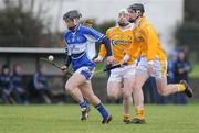 18 January 2009; Eamon Jackman, Laois, in action against Conor McKinley, right, and Neal McAuley, Antrim. Walsh Cup, Laois v Antrim, Kelly Daly Park, Rathdowney, Co. Laois. Picture credit: Brian Lawless / SPORTSFILE