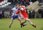 18 January 2009; Aidan Cassidy, Tyrone, in action against Dermot McArdle, Monaghan. Gaelic Life Dr. McKenna Cup, Section B, Tyrone v Monaghan, Healy Park, Omagh, Co. Tyrone. Picture credit: Oliver McVeigh / SPORTSFILE