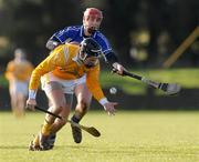 18 January 2009; Michael Herron, Antrim, in action against Mick McEvoy, Laois. Walsh Cup, Laois v Antrim, Kelly Daly Park, Rathdowney, Co. Laois. Picture credit: Brian Lawless / SPORTSFILE