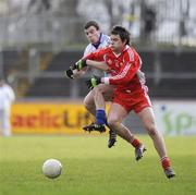 18 January 2009; Raymond Mulgrew, Tyrone, in action against Mark McNally, Monaghan. Gaelic Life Dr. McKenna Cup, Section B, Tyrone v Monaghan, Healy Park, Omagh, Co. Tyrone. Picture credit: Oliver McVeigh / SPORTSFILE