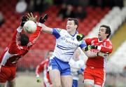 18 January 2009; Brendan McKenna, Monaghan, in action against Michael McGee and Joe McMahon, Tyrone. Gaelic Life Dr. McKenna Cup, Section B, Tyrone v Monaghan, Healy Park, Omagh, Co. Tyrone. Picture credit: Oliver McVeigh / SPORTSFILE