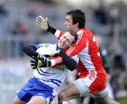 18 January 2009; Paul Meegan, Monaghan, in action against Joe McMahon, Tyrone. Gaelic Life Dr. McKenna Cup, Section B, Tyrone v Monaghan, Healy Park, Omagh, Co. Tyrone. Picture credit: Oliver McVeigh / SPORTSFILE