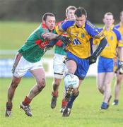 18 January 2009; Brian Higgins, Roscommon, in action against Trevor Mortimer, Mayo. FBD League, Section A, Mayo v Roscommon, Ballyhaunis GAA Club, Ballyhaunis, Co. Mayo. Picture credit: Ray Ryan / SPORTSFILE