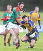 18 January 2009; Brian Higgins, Roscommon, in action against Trevor Mortimer, Mayo. FBD League, Section A, Mayo v Roscommon, Ballyhaunis GAA Club, Ballyhaunis, Co. Mayo. Picture credit: Ray Ryan / SPORTSFILE