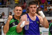 14 August 2015; Joe Ward, Ireland, celebrates victory over Hrvoje Sep, Croatia, during their 81kg light heavy weight semi-final bout with head coach Billy Walsh, left. EUBC Elite European Boxing Championships, Samokov, Bulgaria. Picture credit: Pat Murphy / SPORTSFILE