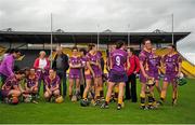 15 August 2015; Wexford players are consoled by family and friends at the final whistle. Liberty Insurance All-Ireland Camogie Senior Championship, Semi-Final, Galway v Wexford, Nowlan Park, Kilkenny. Picture credit: Sam Barnes / SPORTSFILE