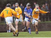 18 January 2009; John Rowney, Laois, in action against Paul Shields, right, and Ciarran Herron, Antrim. Walsh Cup, Laois v Antrim, Kelly Daly Park, Rathdowney, Co. Laois. Picture credit: Brian Lawless / SPORTSFILE