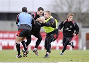 21 January 2009; Ulster's Clinton Schifcofske is tackled by Tom Court during squad training. Newforge Country Club, Belfast. Picture credit: Oliver McVeigh / SPORTSFILE