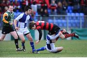 21 January 2009; Shane D'Alton, Kilkenny College, is tackled by Aaron Brown and Andrew Balbirnie, St Andrew's. Vinnie Murray Cup, 2nd Round, Kilkenny College v St Andrew's, Donnybrook Stadium, Dublin. Picture credit: Matt Browne / SPORTSFILE