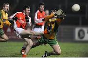 21 January 2009; Joe Feeney, Armagh, in action against Eamon McGee, Donegal. Gaelic Life Dr. McKenna Cup Semi-Final, Donegal v Armagh, Healy Park, Omagh, Co. Tyrone. Picture credit: Oliver McVeigh / SPORTSFILE