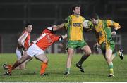21 January 2009; Eamon McGee, Donegal, in action against Joe Feeney, Armagh. Gaelic Life Dr. McKenna Cup Semi-Final, Donegal v Armagh, Healy Park, Omagh, Co. Tyrone. Picture credit: Oliver McVeigh / SPORTSFILE
