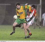 21 January 2009; Eamon McGee, Donegal, in action against Neil O'Rourke, Armagh. Gaelic Life Dr. McKenna Cup Semi-Final, Donegal v Armagh, Healy Park, Omagh, Co. Tyrone. Picture credit: Oliver McVeigh / SPORTSFILE