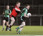 22 January 2009; Brendan McArdle, Queens, in action against Joesph Ireland, Down. Gaelic Life Dr. McKenna Cup Semi-Final, Queens v Down, Pairc Esler, Newry, Co. Down. Picture credit: Oliver McVeigh / SPORTSFILE