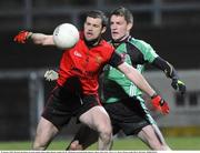 22 January 2009; Martin Cole, Down, in action against James Kielt, Queens. Gaelic Life Dr. McKenna Cup Semi-Final, Queens v Down, Pairc Esler, Newry, Co. Down. Picture credit: Oliver McVeigh / SPORTSFILE